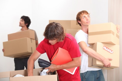 Professional movers handling a house removal in Bow